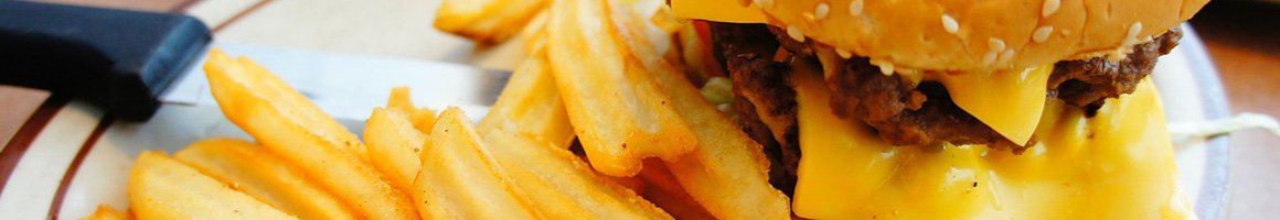 Eating Burger Hot Dog at Kluck's Drive-In restaurant in Ypsilanti, MI.